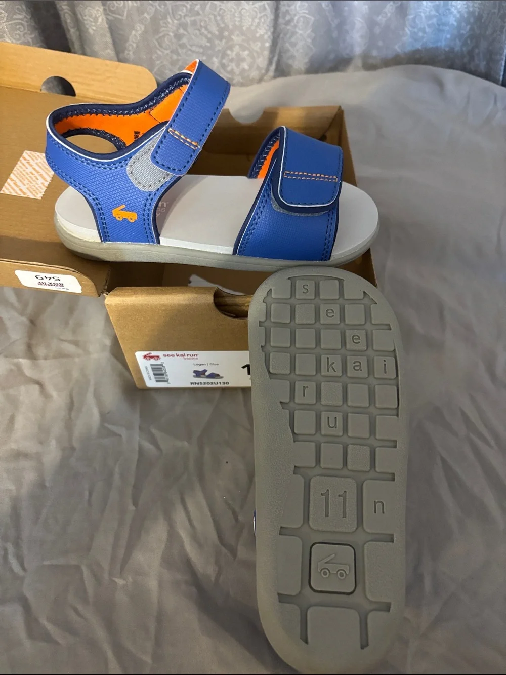 See Kai Run Blue and Orange Kids' Sandals with velcro Straps